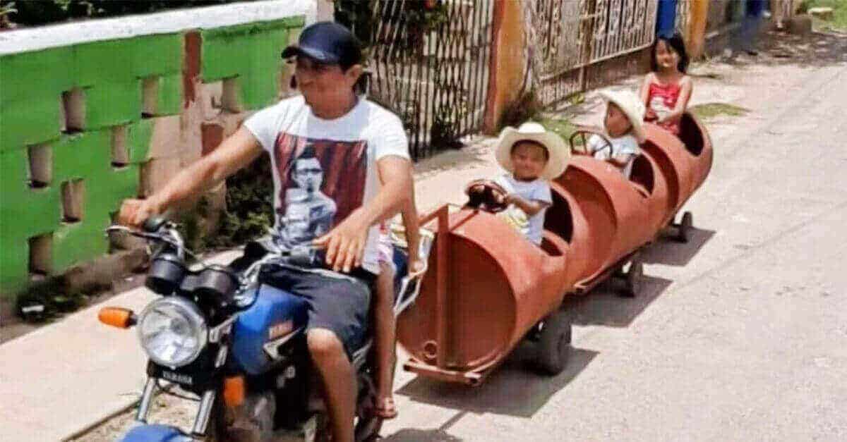 Crea un trenino elettrico con materiale di riciclo per i suoi bambini; per lui i limiti non esistono