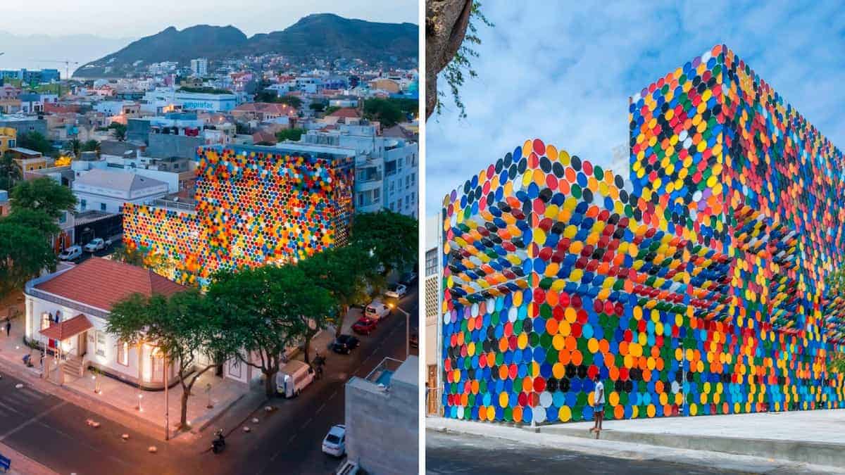 Gli architetti creano una facciata unica con coperchi colorati di barili riciclati
