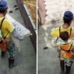Il muratore vietnamita che lavora con il figlio legato sulla schiena